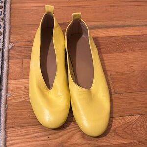 Vibrant Yellow Flats with Sleek Slip-On Design